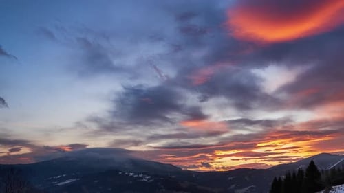 Sunrise Time-Lapse Over Winter Mountains