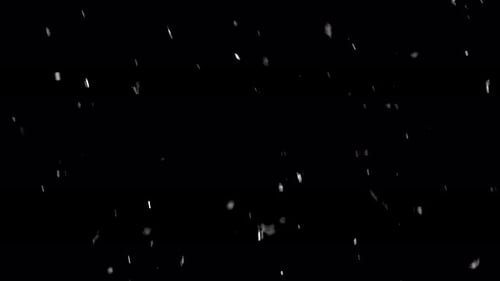 Artificial Snow Falling on a Black Background