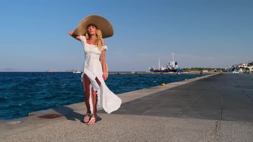Beautiful Girl Tourist Walking on Spetses Embankment Greece