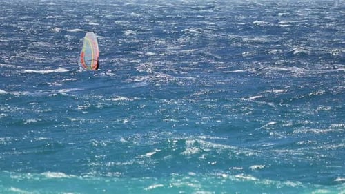 Light Blue Ocean and Man Windsurfing on Waves, Extreme Sport, Active Lifestyle