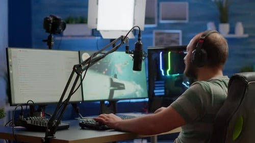 Young Adult Playing Video Game at Home