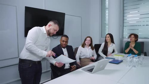 Business Presentation in Modern Office to Colleagues