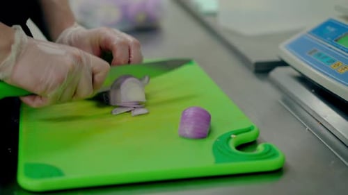 Close Up Cutting Purple Onion Very Quickly
