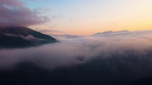 Flying Over the Clouds with the Late Sun