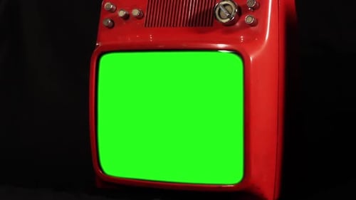 Retro TV Green Screen Against Black Background.