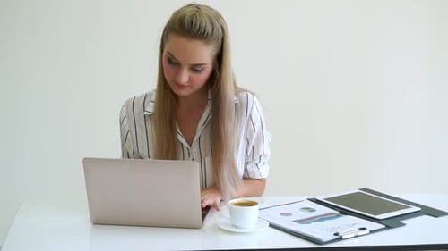 Blonde Business Woman Working at Modern Office