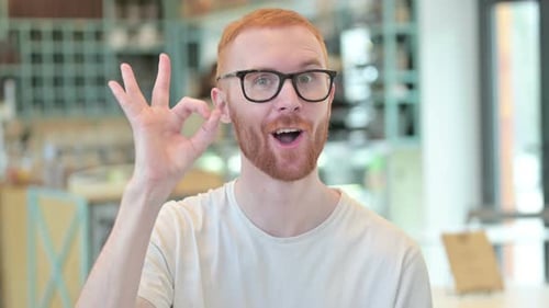 Enthusiastic Man Giving Ok Sign, Close Up