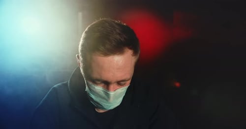 Person Wearing Light Blue Surgical Mask