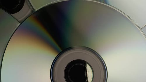 Prise de vue rotative de disques compacts