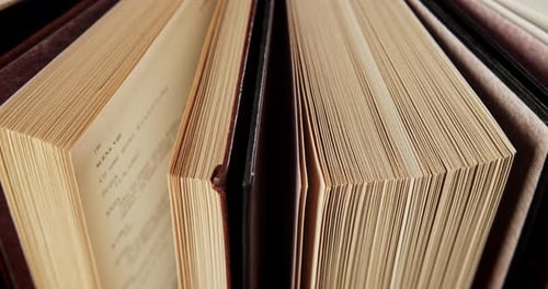 Rotating Beautiful Old Books with Black and Brown Covers