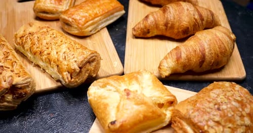 Fresh Baked Pastries on Wooden Boards