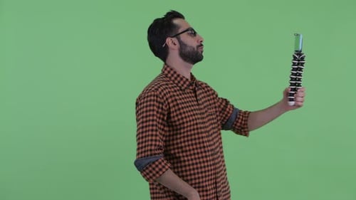 Man Vlogging with Phone on Tripod, Chroma Key