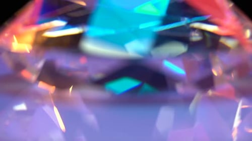 One Diamond Turns and Shimmers in Different Colors