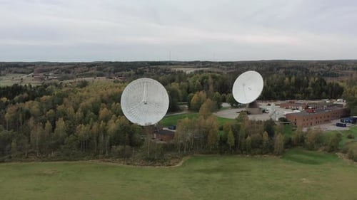 Aerial View of Satellite Dishes in Rural Landscape
