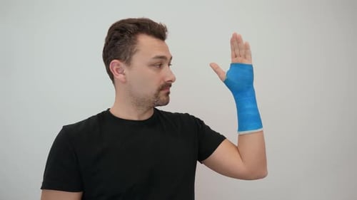 Man with Arm in Blue Cast