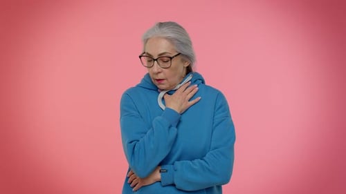 Unhealthy Mature Old Granny Grandmother Coughing Covering Mouth with Hand Feeling Sick Allergy