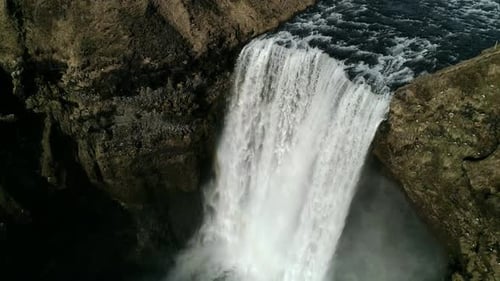 Majestic Waterfall Cascading in a Natural Landscape