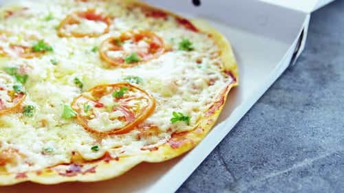 Close Up of Fresh Pizza in Delivery Box