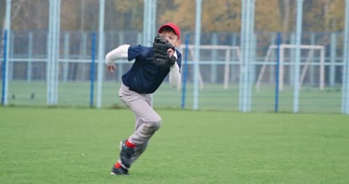 Baseball Tournament at School the Boy Pitcher Run and Successfully Catches a Fastball in the Glove