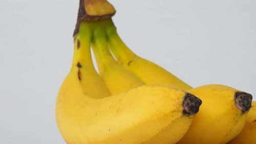 Vibrant Yellow Bananas Cluster Close Up