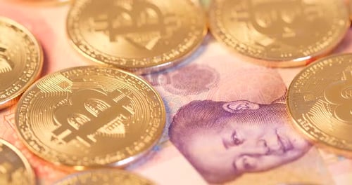 Golden Bitcoins on Chinese Renminbi Currency