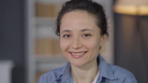 Woman Smiling in Close Up Indoor Portrait