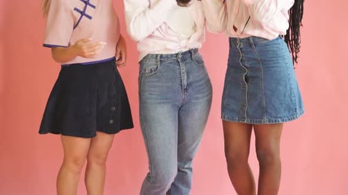 Three Smiling Young Women Laughing Together