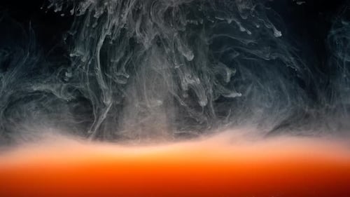 Abstract Ink Cloud in Orange Liquid