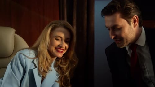 Woman and Man Talking on an Airplane