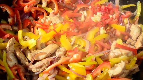 Delicious Chicken Stir Fry Cooking in a Pan