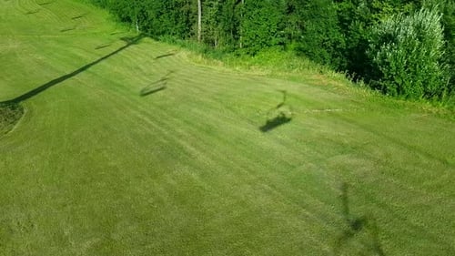 Shadows on the Ground From the Mountain Cableway in Summer Sunny Day
