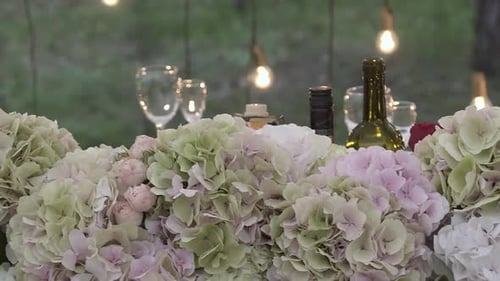 Wedding Table Decorations with Flowers and Wine