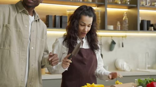 Couple Cooking Together and Taking Pictures