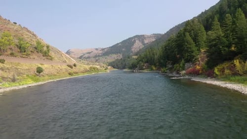 Low Fly Over Hot Spring River In Jackson, Wyoming. Aerial Drone Shot