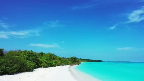 Wide angle above island view of a sunshine white sandy paradise beach and turquoise sea background i