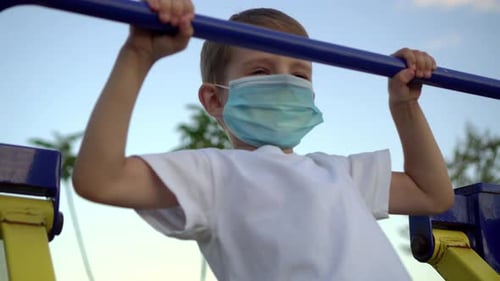 Teenage Boy Medical Mask Is Engaged Sports