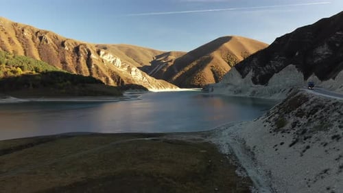 Scenic Lake Surrounded by Mountains Aerial View