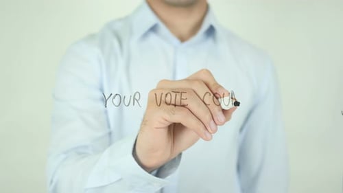Your Vote Counts, Man Writing on Screen