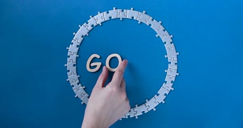 Puzzle Pieces Spell Out the Word 'Goal'