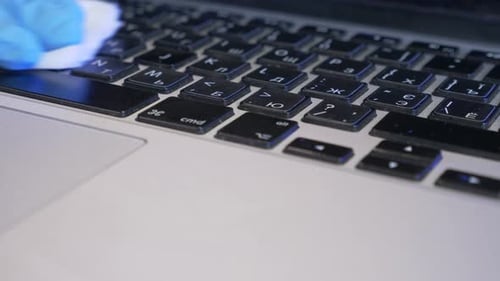 Close Up Cleaning Laptop Keyboard for Hygiene