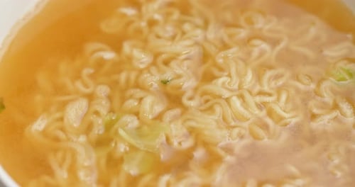 Bowl of Delicious Golden Ramen Noodles