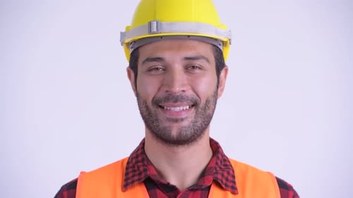 Smiling Construction Worker with Hardhat and Safety Vest