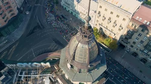 Runners Participate in a Marathon Through City Streets