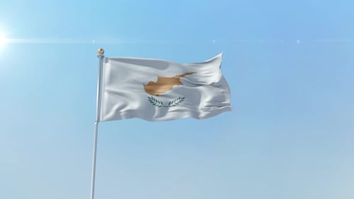 Realistic Waving Flag of Cyprus Against Blue Sky