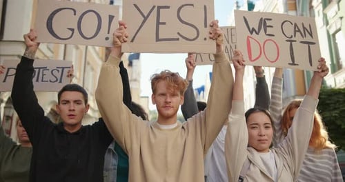 Silent Protest Multiracial Student Activists with Posters at City Streets