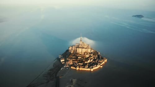 Drone Flying Very High Above Majestic Sunrise Mont Saint Michel, Unreal Castle Island Surrounded