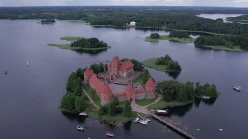 smooth aerial footage of the ancient Trakai castle on the island