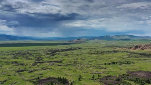 Steppe and Mountains with Rain Landscape