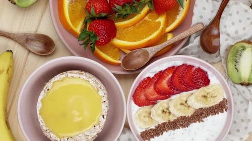 Healthy Breakfast with Fresh Fruits, Yogurt, and Rice Cakes