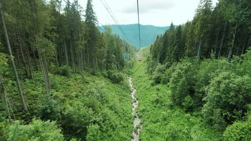 View From the Chair of the Cable Car on the Panorama of the Mountains on a Summer Sunny Day